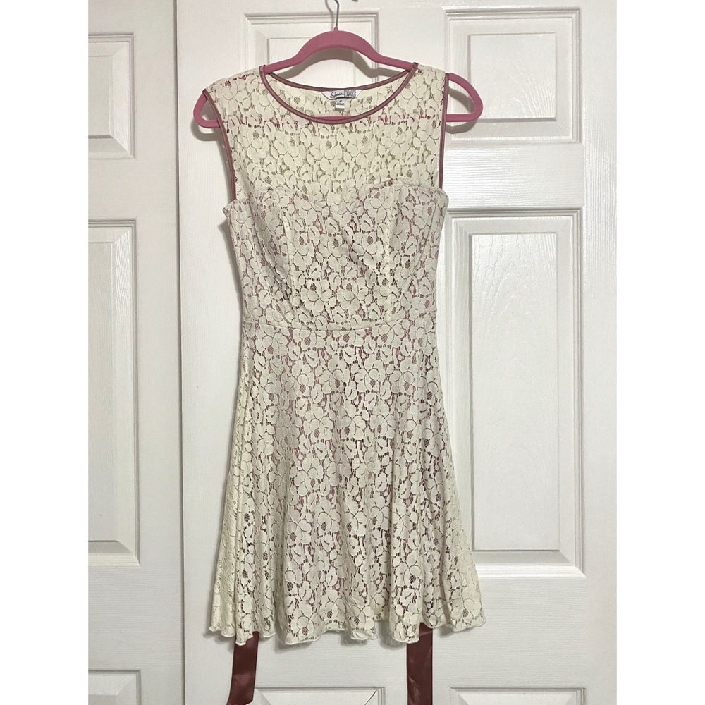 Cream and white lace dress with mauve accents